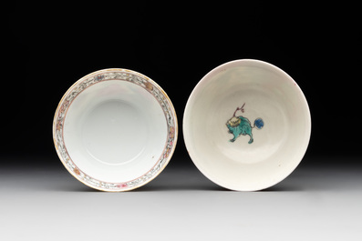 A Chinese famille rose 'erotic' cup and saucer and a ruby-ground 'landscape' cup and saucer, 18th C.
