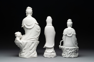 Three Chinese Dehua blanc de Chine figures of Guanyin, 20th C.