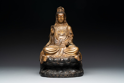 A Chinese parcel-gilt bronze Guanyin and a pair of Bodhisattvas, 20th C.