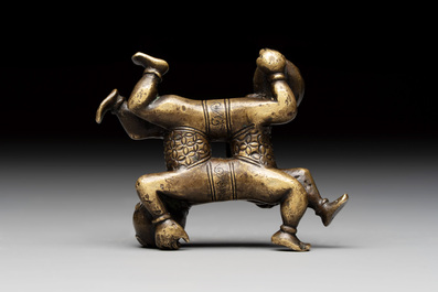 A Chinese bronze scroll weight in shape of two boys, Qing