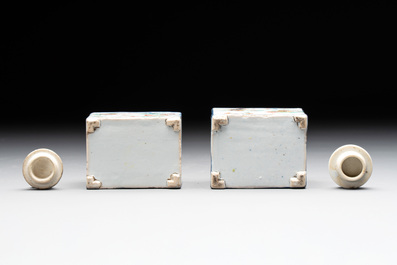A pair of Chinese famille verte rectangular tea caddies and covers with fighting roosters, Kangxi