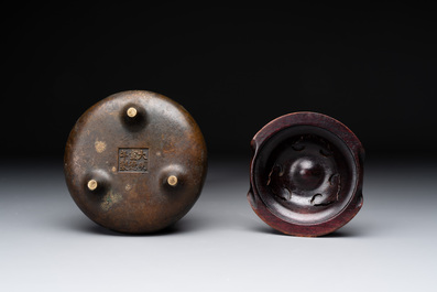 A Chinese bronze tripod censer with wooden cover and stand, Xuande mark, 18/19th C.