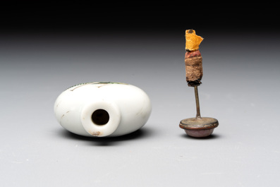 A pair of Chinese blue, white and copper-red 'mythical beasts' and a famille rose 'grasshopper' snuff bottle, Yongzheng and Daoguang mark, 19th C.