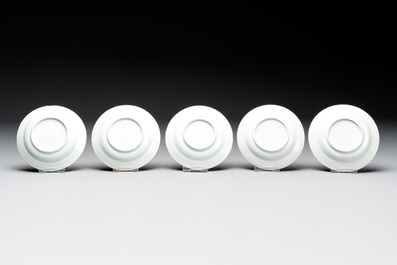 Eight Chinese blue and white cups, 14 saucers and four teapots, Kangxi/Qianlong