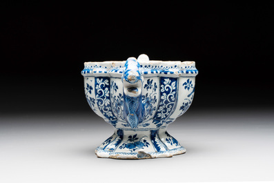 A rare blue and white Dutch Delft tulip vase base with dragon-form handles, 17/18th C.