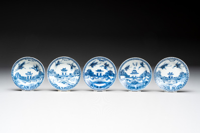 Eight Chinese blue and white cups, 14 saucers and four teapots, Kangxi/Qianlong