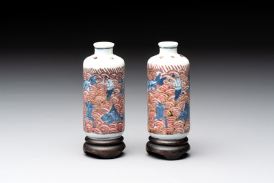A pair of Chinese blue, white and copper-red 'mythical beasts' and a famille rose 'grasshopper' snuff bottle, Yongzheng and Daoguang mark, 19th C.