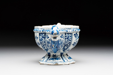 A rare blue and white Dutch Delft tulip vase base with dragon-form handles, 17/18th C.