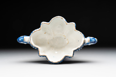 A rare blue and white Dutch Delft tulip vase base with dragon-form handles, 17/18th C.