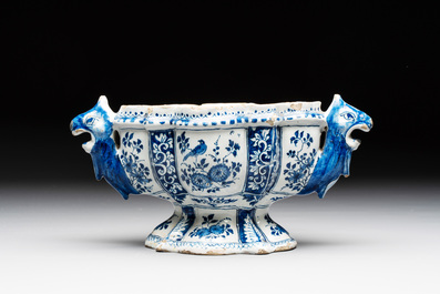 A rare blue and white Dutch Delft tulip vase base with dragon-form handles, 17/18th C.