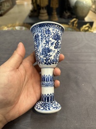 A Chinese blue and white goblet, a silver-mounted salt and a vase, Kangxi