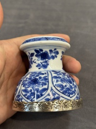 A Chinese blue and white goblet, a silver-mounted salt and a vase, Kangxi