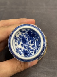 A Chinese blue and white goblet, a silver-mounted salt and a vase, Kangxi