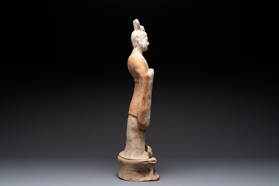 A large Chinese painted pottery figure of a civil official, Tang