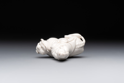 A Chinese 'jun' bowl and a Dehua blanc de Chine group with Guanyin, Ming/Qing