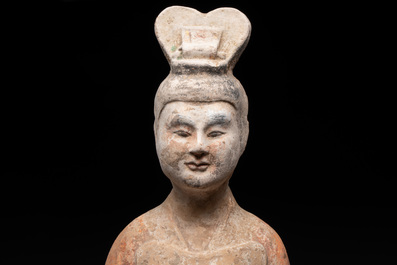 A large Chinese painted pottery figure of a civil official, Tang