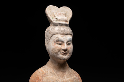 A large Chinese painted pottery figure of a civil official, Tang
