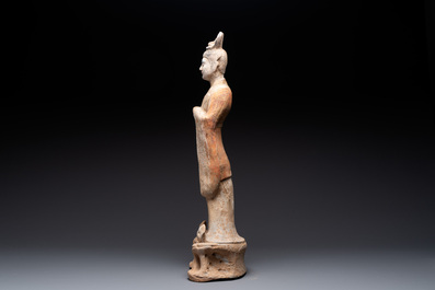 A large Chinese painted pottery figure of a civil official, Tang