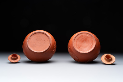 A pair of Yixing-style 'phoenix' bottle vases and covers, possibly England, 18th C.