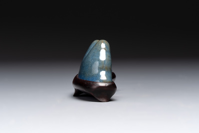 A Chinese blue-glazed Yixing stoneware 'lotus' bowl, and a brush rest on wooden stand, 18/19th C.