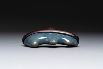 A Chinese blue-glazed Yixing stoneware 'lotus' bowl, and a brush rest on wooden stand, 18/19th C.