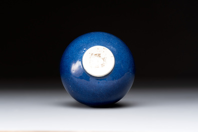 A small Chinese powder-blue bottle vase, 18th C.