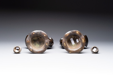 A pair of Chinese bronze duck-form censers, 17/18th C.