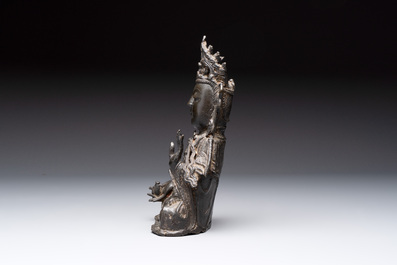 A Chinese bronze seated Guanyin, Ming