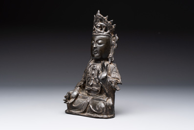 A Chinese bronze seated Guanyin, Ming