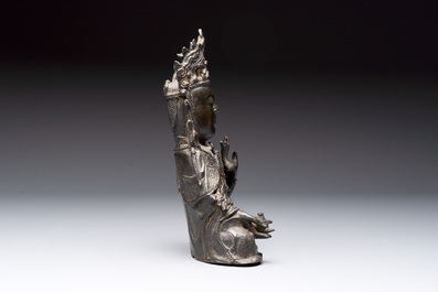 A Chinese bronze seated Guanyin, Ming