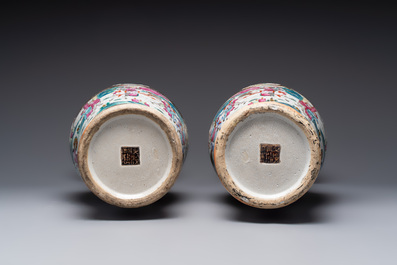 A pair of Chinese Nanking famille rose vases with narrative design, 19th C.