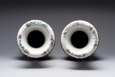 A pair of Chinese Nanking famille rose vases with narrative design, 19th C.