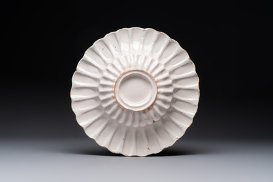 A rare polychrome Dutch Delft 'Chinese horserider' dish, 17th C.