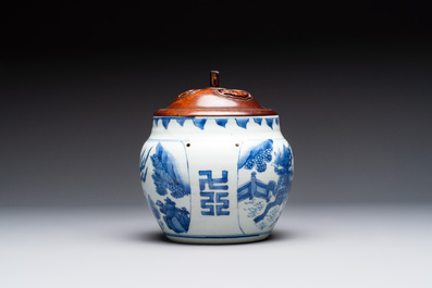 A Chinese blue and white 'qilin' jar and wooden cover, Transitional period