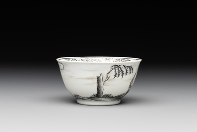 A Chinese grisaille and gilt-decorated 'European subject' cup and saucer, Qianlong