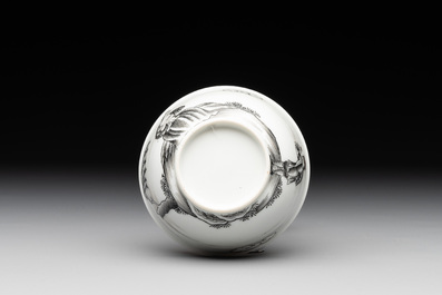 A Chinese grisaille and gilt-decorated 'European subject' cup and saucer, Qianlong
