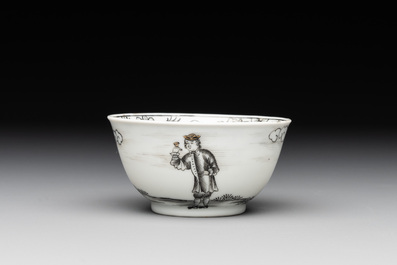 A Chinese grisaille and gilt-decorated 'European subject' cup and saucer, Qianlong