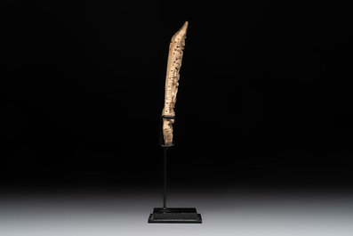A Tibetan carved bone apron ornament with a dakini, 19th C.