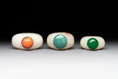 Seven Chinese white and celadon jade snuff bottles, 19th C.