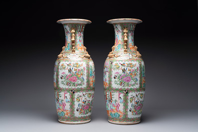 A pair of Chinese Canton famille rose vases with narrative design, 19th C.