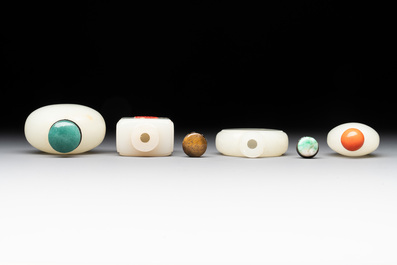 Seven Chinese white and celadon jade snuff bottles, 19th C.