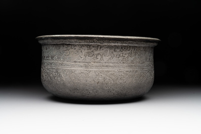 A tinned copper 'kashkul' or begging bowl, a calligraphic bowl and a brass covered jar, Iran, 18/19th C.