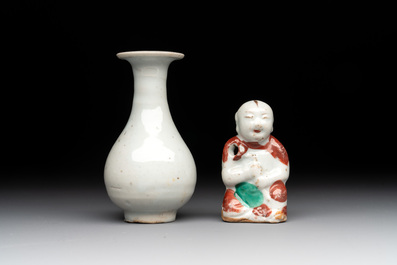Two Chinese Dehua blanc de Chine Buddha and Wenchang figures, a seal paste covered box, a vase and an iron-red-glazed boy, Qianlong mark, 19/20th C.