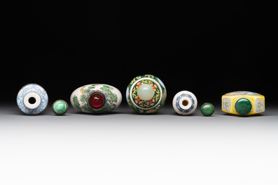 A collection of ten Chinese Canton enamel and porcelain snuff bottles, Qianlong mark, 19/20th C.
