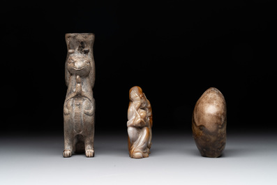A varied collection of 11 Chinese jade and soapstone carvings, 19/20th C.
