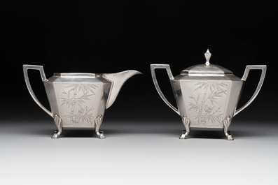 A Chinese silver covered teapot, sugar jar and milk jug with bamboo design, Tackhing 90% silver mark, 20th C.