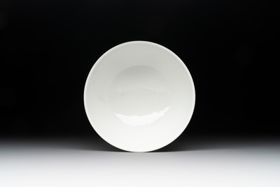A Chinese blue and white cup with floral design, Yongzheng mark, 20th C.