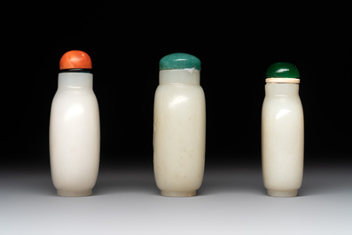 Seven Chinese white and celadon jade snuff bottles, 19th C.