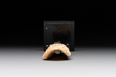 A Tibetan carved bone apron ornament with a dakini, 19th C.
