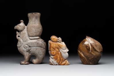 A varied collection of 11 Chinese jade and soapstone carvings, 19/20th C.